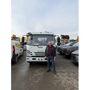 Поставка современного мусоровоза ISUZU Euro 6 для примэрии села Корлэтены