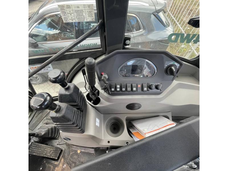 Экскаватор-погрузчик Case 770NX Magnum